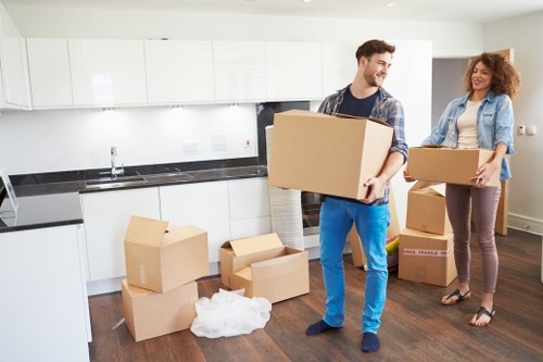 Office relocation preparation with labelled boxes and equipment