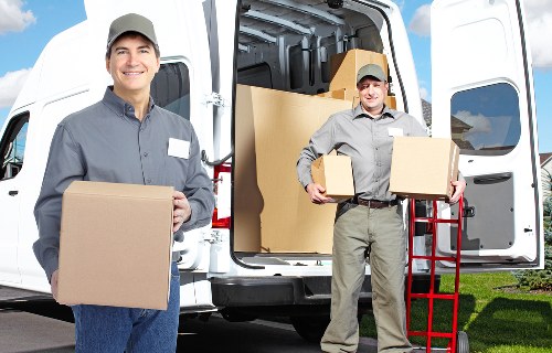 Business items being organised for secure office storage in Kingston
