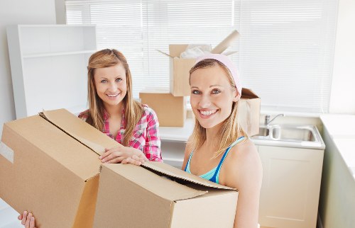 Kingston student move-out with labelled boxes and furniture ready for storage